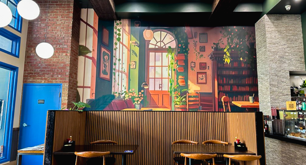 Fresh healthy salads and grain bowls displayed in Sprout Cafe